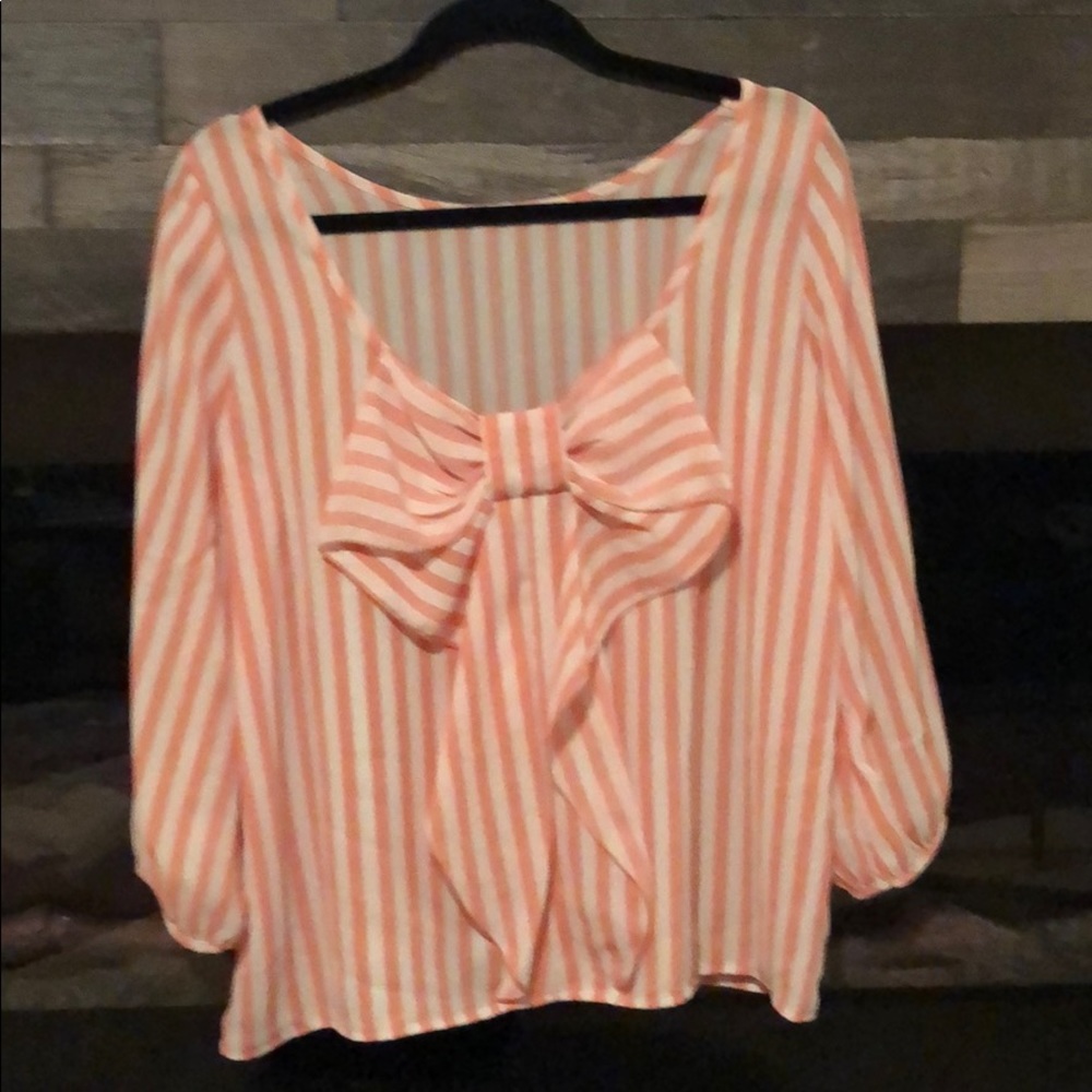 Bow, low backed blouse 3/4 sleeves